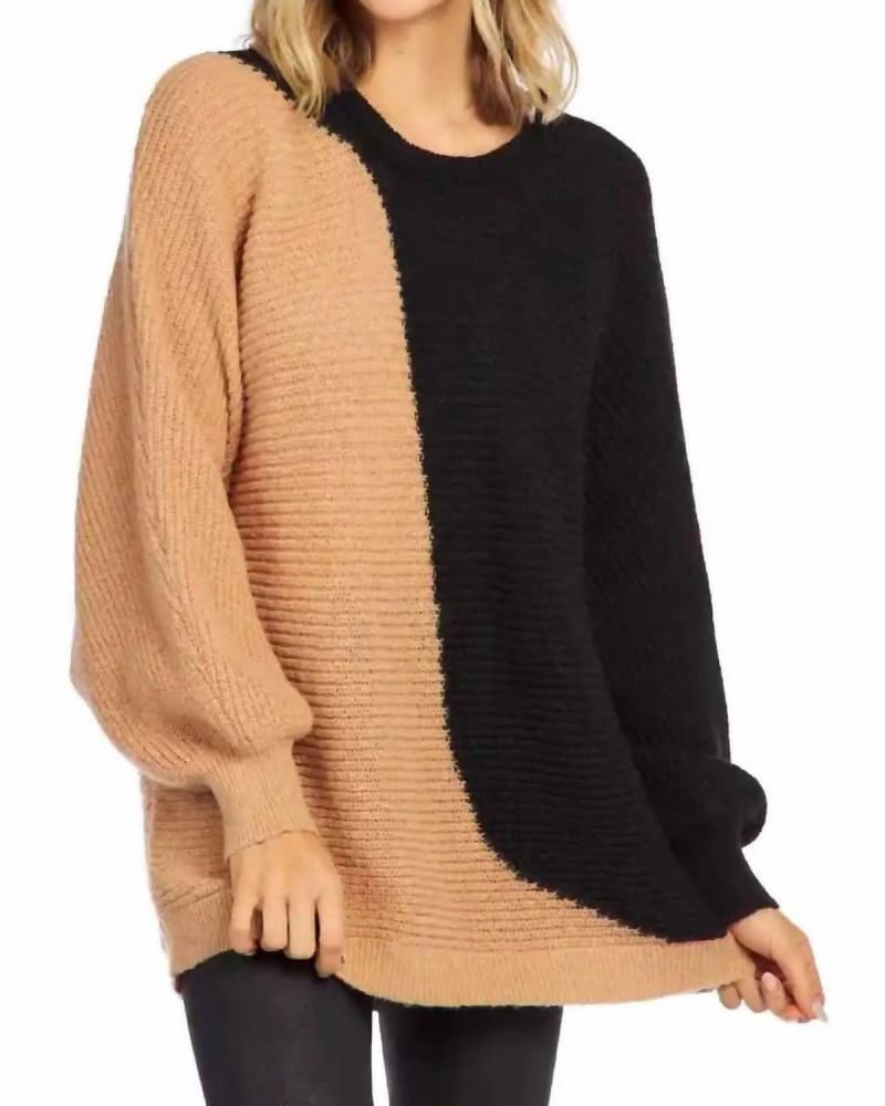 Front of a model wearing a size L Maple Oversized Sweater in Black/Tan in Black/Tan by mudpie. | dia_product_style_image_id:333895